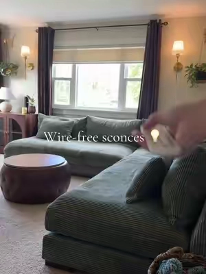 These lights elevated my living room so much 🤯😍  #viyawise #wallsconces #wirelesslights #rechargeablelights #dimmablelamp 
