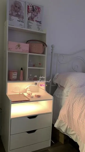 I love this nightstand! Perfect for a small spaces, it has the LED lights and charging port. 2 drawers and shelves for decor or books!💗✨ #nighstand #bedroominspo #roomfurniture #nightstandorganization #nightstandstyling 