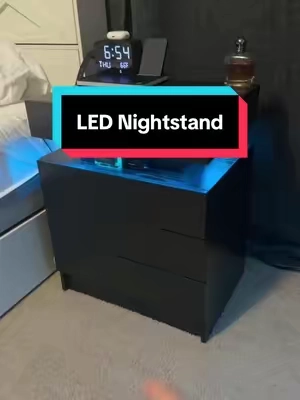 If you don’t have an outlet next to your bed this LED nightstand is the perfect fix  #nightstand #bedsidetable #bedroom #bedroomfurniture #ledlights 