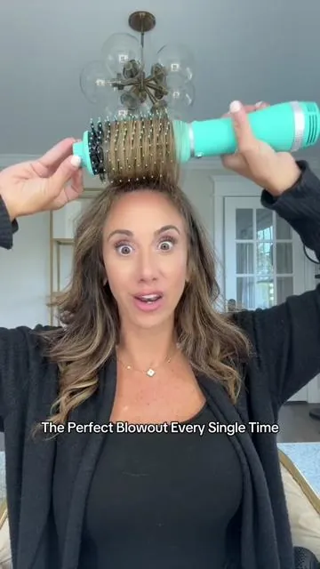 Use Code “LANGVIP104” to get 10% off your purchase!  The new Volume Boost by @langehair is UNBELIEVABLE!!!  It's lighter it's more powerful, it's somehow even cheaper than the original and the barrel is infused with coconut oil leaving the most insane shine on your hair!!!  #blowoututorial #blowoutbrush #salonhair #frizzfreehair #blowouthair 