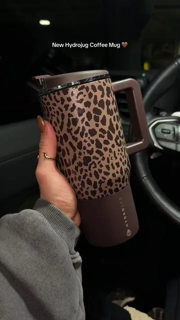 This new leopard print hydrojug traveler coffee mug is everything 😍😍 #hydrojugtraveler #hydrojug #coffeemug #coffeecup #tiktokshopblackfriday 
