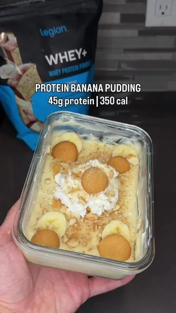 PROTEIN BANANA PUDDING 🍌 45g protein | 350 calories | 35g carbs | 5.5g fat Ingredients: • 200g nonfat Greek yogurt • 1 scoop Legion Banana Bread or Vanilla whey • 1 tbsp sugar free banana cream pudding mix • 1 tbsp Fairlife fat-free milk  • 1 tbsp  low-fat cream cheese  • ½ tsp vanilla extract  • ½ tsp monk fruit  • ½ banana • 3 Nilla wafers crushed on top  Freeze for 10min @Legion Supplements  banana bread whey - grab from TikTok shop #highprotein #proteinrecipes #healthyrecipes #proteincheesecake #healthydessert