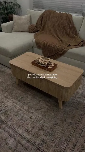 i love multi functional furniture 🤎 this coffee table does it all! #coffeetable #multifunctional #modernhome #multifunctionalfurniture #organicmodern 