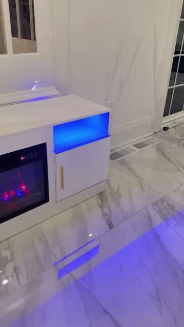 This is the Upgraded 70” Fireplace Tv Stand from Pukami! This one has the Realistic Logs and does 12 Different Flame Colors and 750w-1500w of Heat. It does 16 Different colors on your side lighting. It has soft close hinges on the cabinet doors. It comes with a Remote to control your heat and light settings.@PUKAMI #fireplace #fireplacetvstand #tvstand #tiktokshopholidayhual #musthaves 