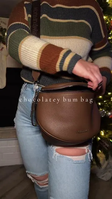 She’s back in stock 🙌🏼🤎 @Rustic Charm Bootic #purse #pursetok #wranglerpurse #crossbodybag #bumbag 