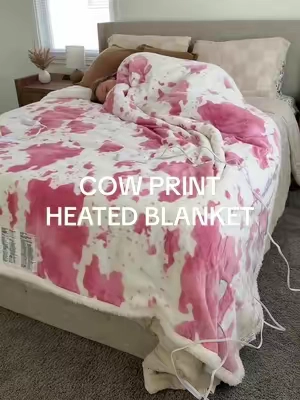 I want every single color omg 😍  #bluniquehome #cowprint #heatedblanket #cowprintblanket #dualcontrolheatedblanket 