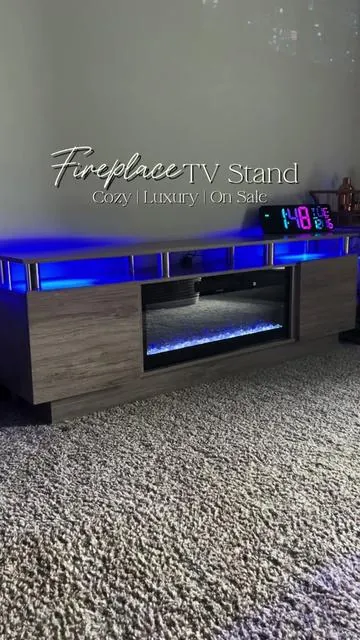 My living room finally feels warm, cozy, and put together 🤍 This fireplace TV stand completely changed the vibe without trying too hard. Modern, functional, and perfect for cozy nights in. #fireplacetvstand #livingroomdecor #luxuryhomedecor #cozylivingroom #tiktokmademebuyit 