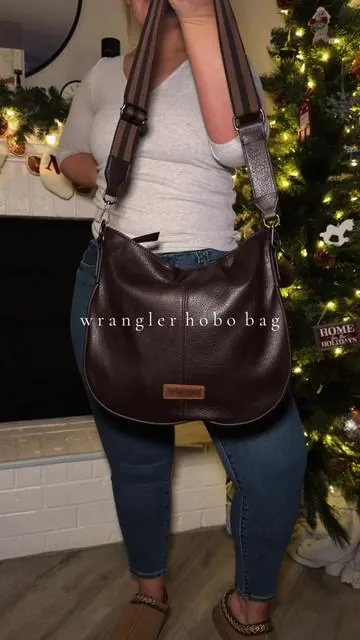 Such a pretty bag 🤎✨ @Rustic Charm Bootic #purse #pursetok #wranglerpurse #crossbodybag #hobobag 