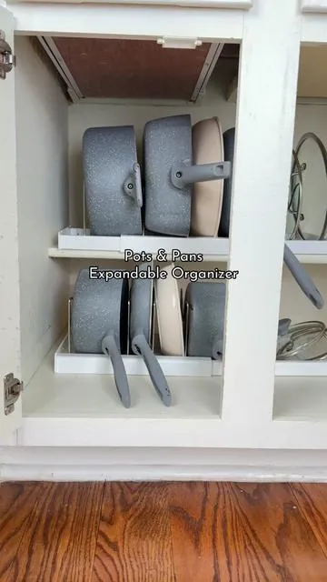 😍 Installed a pots and pans organizer and now my cabinets give quiet luxury, not kitchen chaos 🖤 #kitchenorganization #kitchenhacks #potsandpans 