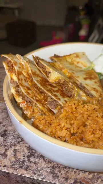 cooking dinner for my family 😋 was craving Taco Bell so we did beef & cheese quesadillas at home! They were 10/10!! @Old El Paso @kraft @Daisy Brand @Farberware Cookware  #familydinnerideas  #cookingformyfamily  #familydinnerideas #tacobellathome  #TikTokCreatorSearchInsightsIncentive 