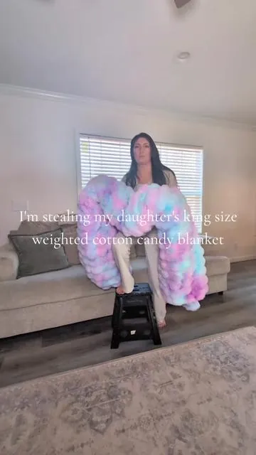 it's like an actual cotton candy cloud that's weighted 😌 an elite blanket! I just need one for myself now! @Bedsure  #blanket #weightedblanket #homefinds #cozy #fyp 