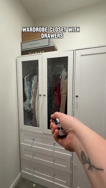 This wardrobe closet has been a game changer👏🏼 #wardrobe #closet #tiktokshopping #barndominium #tiktokshopfinds 