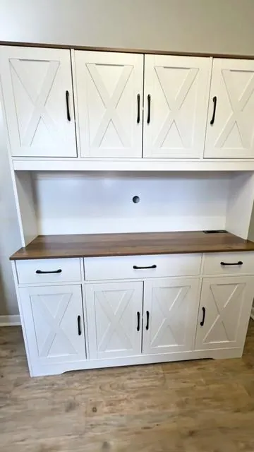 Everyone thinks this is a custom built-in… but it’s actually from the TikTok Shop 😳✨ ✅ Tall kitchen pantry storage ✅ Huge countertop space (perfect coffee station) ✅ Built-in charging station ✅ Three deep storage drawers ✅ Stunning farmhouse design that looks high-end I originally bought this just for a coffee bar… and it turned into one of my favorite kitchen upgrades ever. It made my kitchen feel more elevated, more intentional, and insanely functional— without a renovation or custom pricing. If you need more counter space or pantry storage, this will change your kitchen. Don’t wait—this is one of those finds that always sells out. 🛒 Tap the orange cart before it’s gone. #Tik#TikTokShopFindst#KitchenOrganizationn#PantryStorager#FarmhouseKitchenmeFinds 