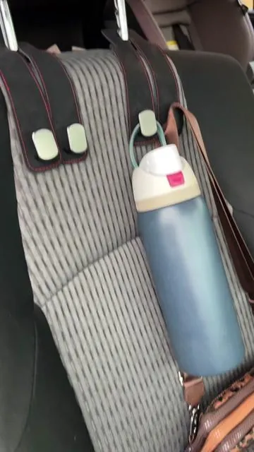 These little hooks are a GAME CHANGER 🚗👜 Perfect for groceries, diaper bags, purses, backpacks & more. No more bags rolling around the car 👏 Such a simple car upgrade you didn’t know you needed! #tiktokshop #carorganization #carfinds #musthavecar #momcar     