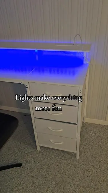 Computer desk with outlets, USB, and lights. Also love the top shelf for the monitor. #computerdesk  #desk  #affordable  #furniture  #gamingdesk 