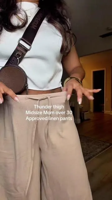 These linen pants are a midsize girl’s dream. Soft, breathable, and actually flattering, they sit comfortably on the waist without digging in or clinging to the lower belly. If you’re over 30 and done with stiff “hard pants,” this is the effortless upgrade your wardrobe needs. Perfect for everyday wear, travel, errands, and vacation outfits when you want to feel put together without sacrificing comfort. These are the kind of linen pants you reach for all summer because they move with your body and still look polished. #linenpants #midsizefashion #softpants #cotton #linen