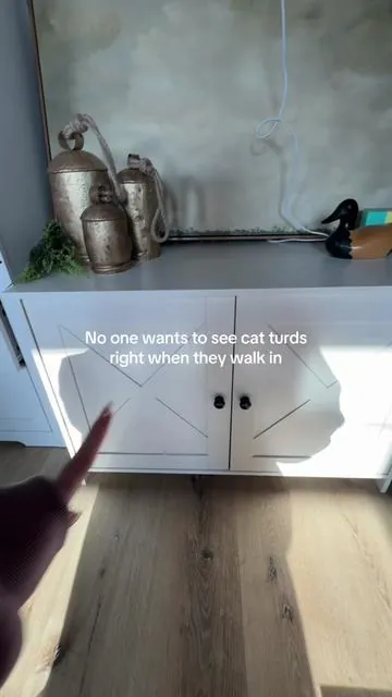 This cat litter cabinet is my favorite peice of furniture in my tiny house!! 
