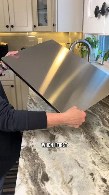 This stainless steel board has become the primary work surface in my kitchen. I use it for all my food and meal prepping. #stainlesssteel #cuttingboard #noplastic #kitchenessentials #plasticfree 