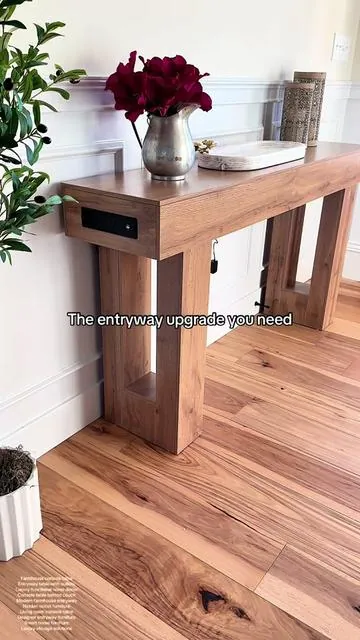 This farmhouse console table makes your space look custom while secretly adding outlets and soft lighting. If you love functional luxury that keeps your home clean and elevated, this is it. #consoletable #homedecorideas #entrywaydecor #homedecorinspo #aesthetichome 