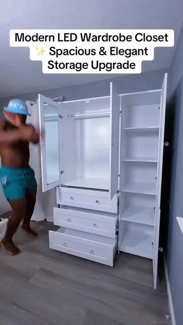 Upgrade your bedroom with this stylish VOWNER 3-Door Wooden Wardrobe 🤍 Featuring a hanging rod, multiple shelves, spacious drawers, and a beautiful glass door with LED light, it’s perfect for organizing clothes, shoes, and accessories in one place. ✔️ Large capacity storage ✔️ Built-in hanging rod ✔️ Smooth sliding drawers ✔️ Elegant glass door with LED lighting ✔️ Modern freestanding design Perfect for apartments, houses, or anyone needing extra closet space without renovation. 🏡✨ #tiktokshop #wardrobecloset #bedroomupgrade #homeorganization #furnituredeal