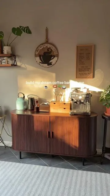 This sliding door cabinet was the perfect addition to my coffee bar and pretty simple to put together! #coffeebar #cabinet #coffeecabinet #coffeetok #flutedfurniture 