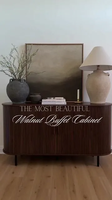How gorgeous is this walnut fluted cabinet from @ONBRILL OFFICIAL 🤎 I plan to use this in my office space. It’s so versatile could literally be used anywhere like your dining room, as a coffee bar or even an entry table. I love the dark walnut color and the rounded edges. Also love that you can show case decor by opening it or simply have extra storage space.  Thank you onbrill for this collaboration 🤎 #onbrill #buffetcabinet #cabinet #homedecor #cozyhome 