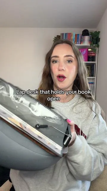 If you love reading in bed or on the couch, the Viozon Lap Book Pillow Stand with Storage from Viozon US is a game changer, especially for physical book readers.  Hands-free, adjustable, has storage space inside, and actually comfy on your lap. 📖 Hands-free reading 🛋️ Cozy lap beanbag pillow 🔄 Multi-angle adjustable stand 🗂️ Built-in storage for pens/notes 📱 Holds books, tablets & e-readers #BookAccessories #ReadingSetup #bookpillow #kindlepillow  #lapdesk @viozon US 