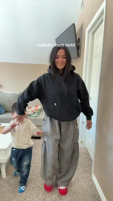 Don’t worry, yours most likely won’t come with stickers all over it 🤪 @UEU #ginghampants #checkeredprint #momfail #stretchypants #tiktokshopcreatorpicks 