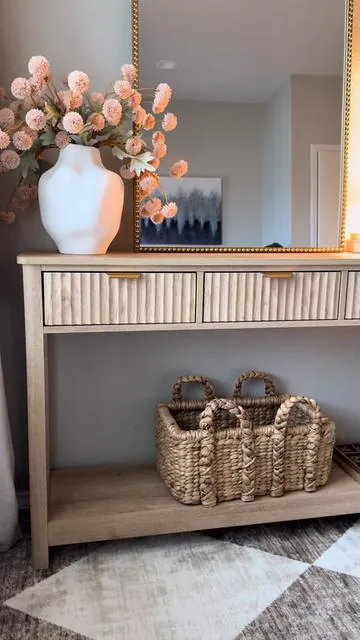 For my neutral decor lovers… this console is such a statement without being loud. The fluted detail adds the perfect amount of depth and warmth, and it works year-round with any styling. Minimal effort, maximum impact. It completely upgraded the vibe of my space 🤍✨ #furniture #flutedfurniture #consoletable #entrywaytable #tiktokshopfinds 