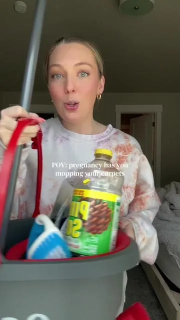 POV: i’m 34 weeks pregnant today and mopping my carpets. 🧽🫧 how far along are you? pour a whole bottle of pinesol all over my dirty carpets for a clean carpet mopping with me 🧽🧽 with dirty water dump at the end! pregnancy nesting is CRAZY. what should i mop or clean next?? #CleanTok  #asmrcleaning #pinesol #nesting #pregnancyvlog 