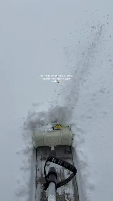 this saved my back ❄️ 8-10 inches of snow and it went through it like nothing. cordless, rechargeable, and way easier than shoveling by hand! #electricsnowshovel #snowremoval #winterstorm #snowdays #midwestwinter 