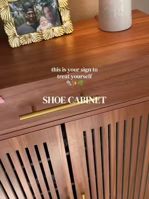 The shoe cabinet that saved my entryway! Holds way more than you’d think + keeps everything looking tidy. 🤌🏼  #shoecabinet #entrywaytable 