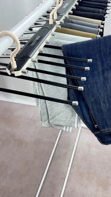 Pants hanging like soldiers in perfect formation 😂 #ClosetSatisfaction #NeatFreak