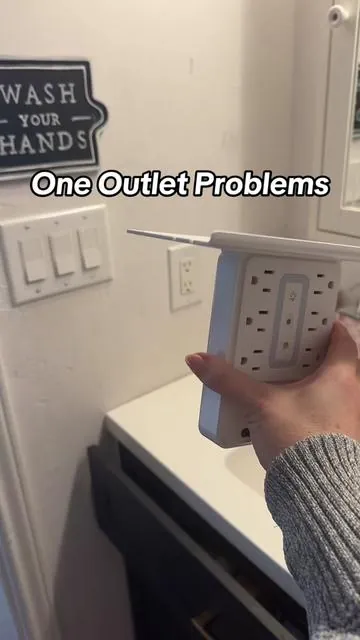 Outlet extender with nightlight and shelf for storage! Add extra outlets to any room. This is perfect for my bathroom that only has one outlet. It’s a surge protector and outlet extender all in one! #OutletExtender #SurgeProtector #WallOutlets #Nightlight 