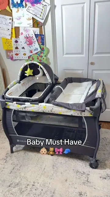 Deluxe Portable Nursery Center is a LIFE saver. It's a playard, bassinet, changing table  & cozy napper all in one. Easy to set up, safe for newborns, and even has storage for baby essentials. Perfect for travel or at home #BabyTrend #NurseryEssentials #crib #BabyMustHaves #ParentTok