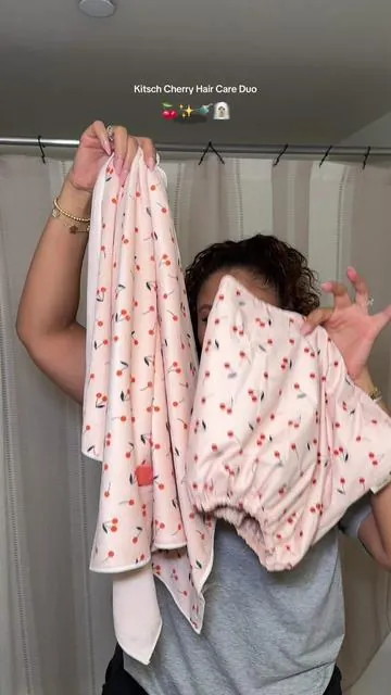 The Kitsch Cherry Hair Care Duo is the cutest way to cut dry time + fight frizz 🍒✨  Ultra-absorbent microfiber hair towel & satin-lined cherry shower cap to protect curls, braids, blowouts & more. Wash day and non-wash day approved 👏🏽 #kitsch #kitschshowercap #satinlined #hairtowel #frizzfreehair @Kitsch 