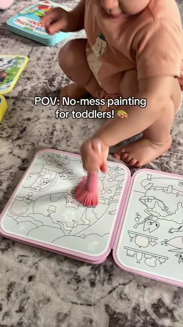Such a great way to start learning how to color! 🎨 Since it’s just water, she can practice staying in the lines without any mess. Perfect for home or even in the car. #watercolorpainting #toddlerlearning #waterpaintingbook 