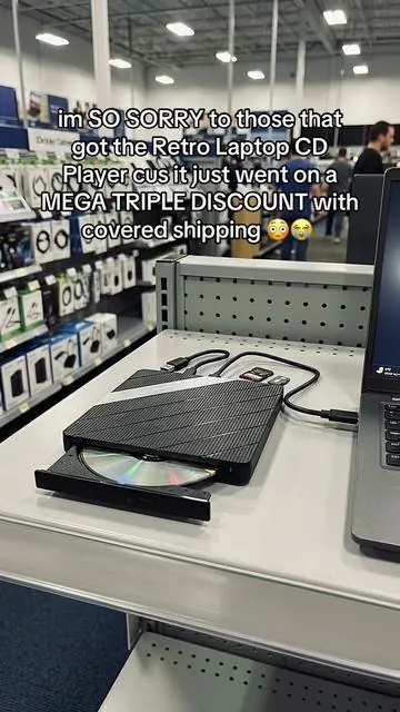 Retro Laptop CD Player #tiktokshopcreatorpicks #tiktokshopstockup #tiktokshopspringglowup DISCLAIMER: AI-generated product visualization. Not filmed in a real store. 