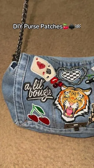 I bought this in purse sale for five dollars and hooked her up with some love! #fyp #pursetok #baglover #diy #patches 🎱🍒🏁🐅❤️🔥