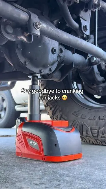 Lifting car with VEVOR Electric car jack #fyp #cars #electriccarjack #roadsideassitance #tiktokshopfinds 