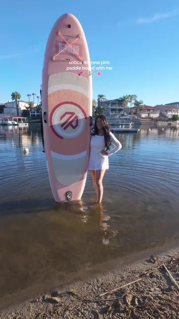 Summer just upgraded. ☀️🌊 Finally unboxed my new paddle board from @Niphean and I’m OBSESSED already. Lake days, golden hour paddles, and content coming soon. ✨🏄🏻‍♀️🫧 Linked it here if you’ve been wanting one too. 🤭🩷 #tiktokshop #paddleboard #lakelife #summeressentials #creatorfinds