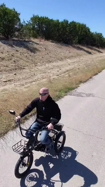 I took this @Eskute electric trike out just to ride down the driveway and check the mail… and I ended up cruising around the neighborhood for a while. 😆 What I like about this one is the three wheel stability. You don’t have to balance like a normal bike, which makes it super comfortable for casual riding. It also has fat tires for a smooth ride, a powerful motor, and two baskets so you can actually carry things with you. This would be perfect for: ✔ Neighborhood rides ✔ Running quick errands ✔ Carrying groceries or packages ✔ Anyone who wants stability instead of balancing a bike If you want to see the full details on it, click the orange shopping cart on this video and check it out. #ElectricTrike #ElectricBike #EBikeLife #NeighborhoodCruiser