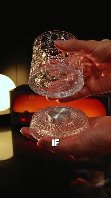 Light and shadow meet — the view is in the glass.🧊🥃🎵#Tipsy #WhiskeyGlass #Whiskey #drink #glass #cup 