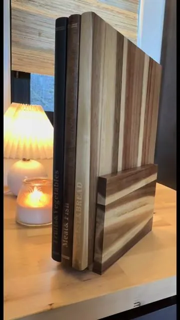 So fun, so aesthetic, and so functional! Three-piece wooden book set that also function as cutting boards. Each one is color-coded and labeled for cheese and bread, seafood, and meat, fruits, and veggies! Made from Acacia wood and food safe! Compare these to one of the famous big box stores like PB  - these are handcrafted and excellent quality. The wooden stand is also included. #CuttingBoards #KitchenAesthetic #WoodenBookSet #BookCuttingBoards #KitchenEssentials @Welsteepse 