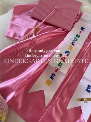 Buy the gown, take the photos, have the memory forever 🩷🌸  #kindergarten #kindergartengraduation #toddlermom #memories #kindergraduation 