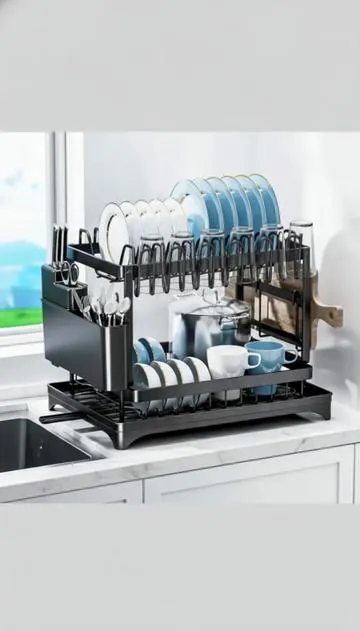 Say goodbye to countertop clutter! 👋 This 2-tier dish drying rack brings serious organization to your kitchen. Featuring a clever drainboard and a detachable design, it makes dish duty so much simpler. And when you need extra room, it conveniently folds away for smart space saving. Keep your kitchen tidy and efficient with this must-have organizer. Shop now and streamline your dish-drying! #kitchenorganization #dishdrying #spacesaver #homegadgets #AIGC #Moras