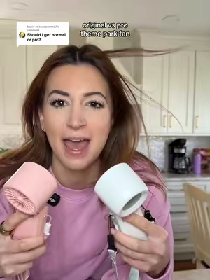 Replying to @kssecretttt67 orginal vs pro! the portable handheld cooling fan is the only way to stay cool! #portable #portablefan #coolingfan #travelhacks #themepark 