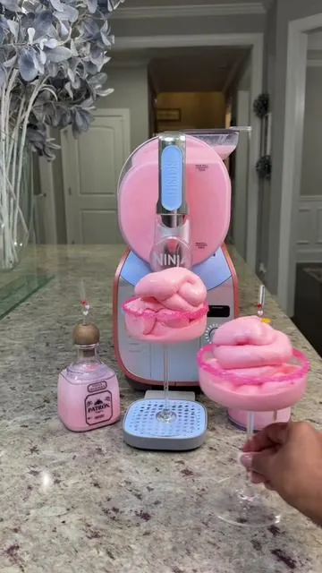 Soft Serve Strawberry Margarita 🍓💕Recipe 💕⤵️ We officially have soft serve strawberry margaritas at the house and I’m not going back 💕 The color came out the prettiest soft pink and the texture is EVERYTHING… smooth, creamy, and perfectly frozen just like a true soft serve. Made this directly in the Ninja Slushy Maker and it did all the work for me. No ice, no blender, just pour, set it, and let it do its thing. This is exactly what summer at home is about… cute drinks, good vibes, and something that looks just as good as it tastes. I already know these are about to stay on repeat all season long 💕🍓 Recipe 💕⤵️ 40 oz Patrón tequila 16 oz strawberry puree 16 oz fresh lime juice 10 oz heavy whipping cream 10 oz sweetened condensed milk 10 oz simple syrup 10 oz orange liqueur Add everything directly into your Ninja Slushy Maker and run on Spiked Slush or Slush setting. Let it spin until it reaches that perfect soft serve consistency, then dispense into your glass and enjoy. Pro tip: The combo of heavy cream and sweetened condensed milk is what gives you that ultra creamy soft serve texture and that perfect soft pink finish 💕 Drink responsibly 💕 Save this because you’re going to want to make this one and tag me when you do 💕🍓 #cocktails #cocktailswithchelsea #recipes #ninja #margarita @Ninja Kitchen 