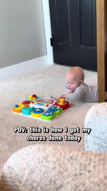 The cutest busy board for the cutest boy! This keeps him busy for atleast 15 minutes for some much needed mom time. #busyboard #toysforbabys #firsttimemom #busybaby #onthegotoys