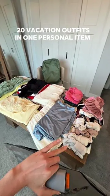 How I pack 20(+) outfits in a carry on only! My fiancé was so proud haha #vacuumbag #vacuumsealbag #packwithme #packinghacks 